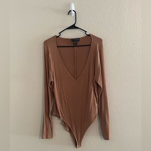Taupe long sleeved body suit